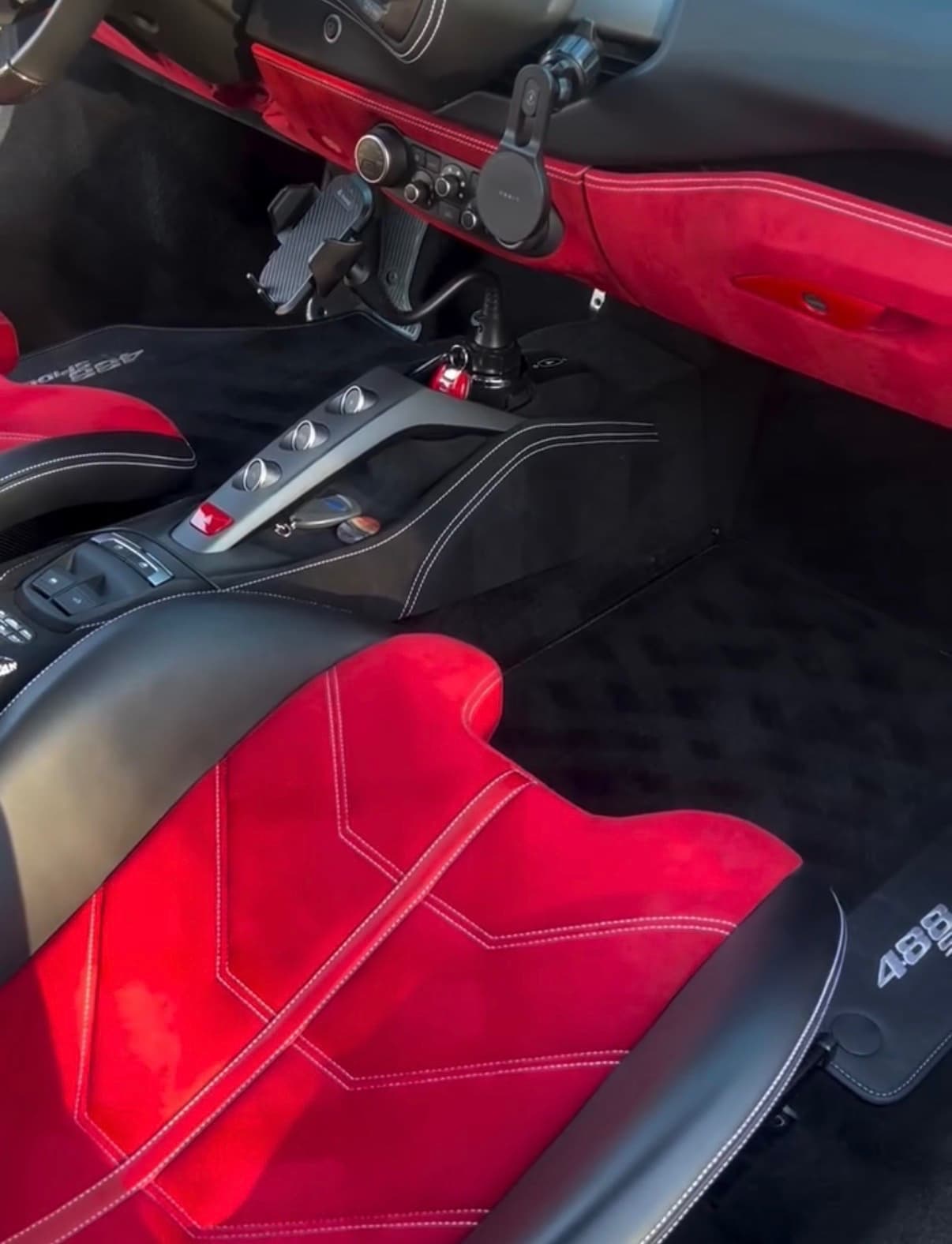 Ferrari red leather interior after a mobile interior detail by Spotless Detail in Scottsdale