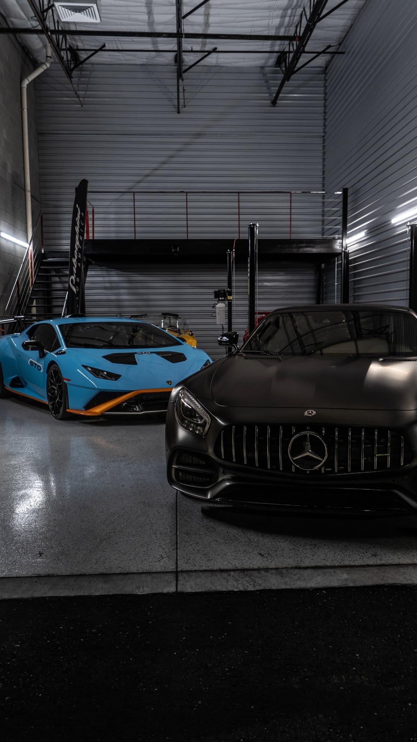 Lamborghini Huracán and Mercedes-AMG GT freshly detailed in a client's Scottsdale garage by Spotless Detail